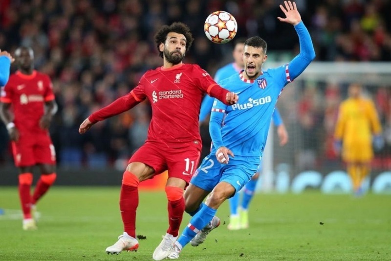 Cảnh cầu thủ Liverpool ăn mừng bàn thắng trên sân Anfield, thể hiện phong độ thăng hoa của Lữ đoàn đỏ trước trận gặp Atletico Madrid
