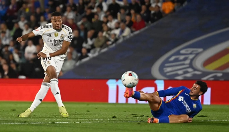 Real Madrid thắng nhọc Getafe, trở lại ngôi đầu La Liga - Ảnh 1